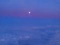 Moonrise over the cloudscape, returning from Edinburgh