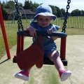 Violet loves swings!