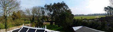 view over the garden into the donkey field beyond